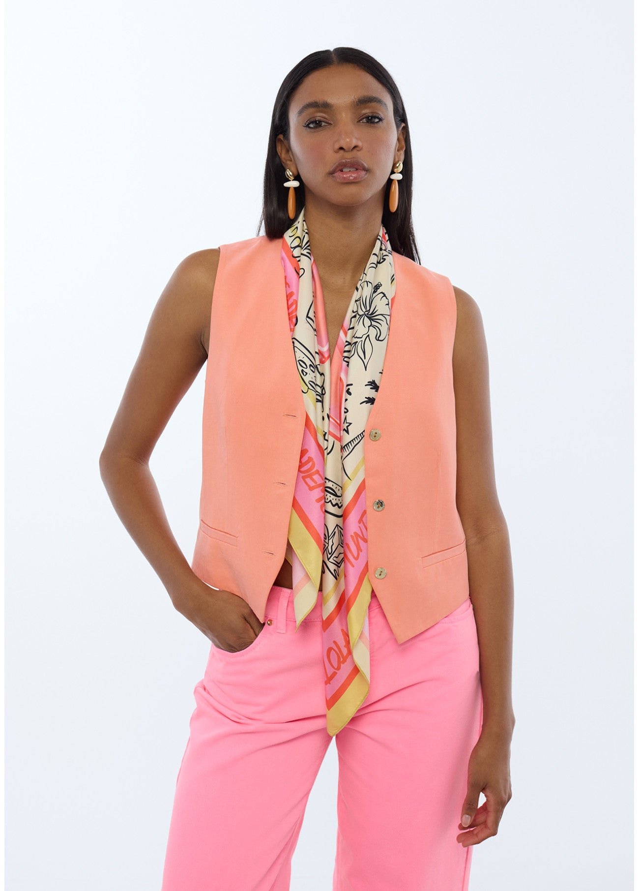 CHALECO SASTRERO ENTALLADO CORAL