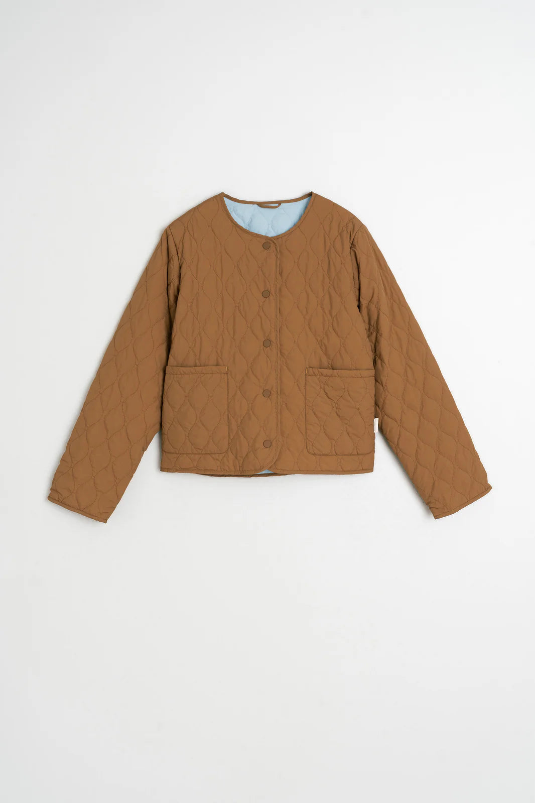 ABRIGO ACOLCHADO REVERSIBLE ALMENDRA